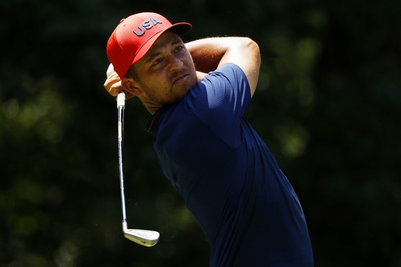 epa09383987 Xander Schauffele of USA tees off on the fourth tee during the Men&#039;s Individual Stroke Play Round 4 at the Golf events of the Tokyo 2020 Olympic Games at the Kasumigaseki Country Club ...