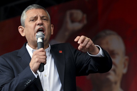 epa12448458 Ozgur Ozel, leader of Turkish Republican Peoples Party (CHP) speaks to supporters during a rally in Brussels, Belgium, 12 October 2025. CHP held its first overseas rally in Brussels addres ...