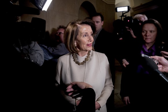 House Speaker Nancy Pelosi of Calif. speaks to members of the media as she arrives on Capitol Hill in Washington, Friday, Jan. 25, 2019. Pelosi answered questions about the indictment of longtime Dona ...