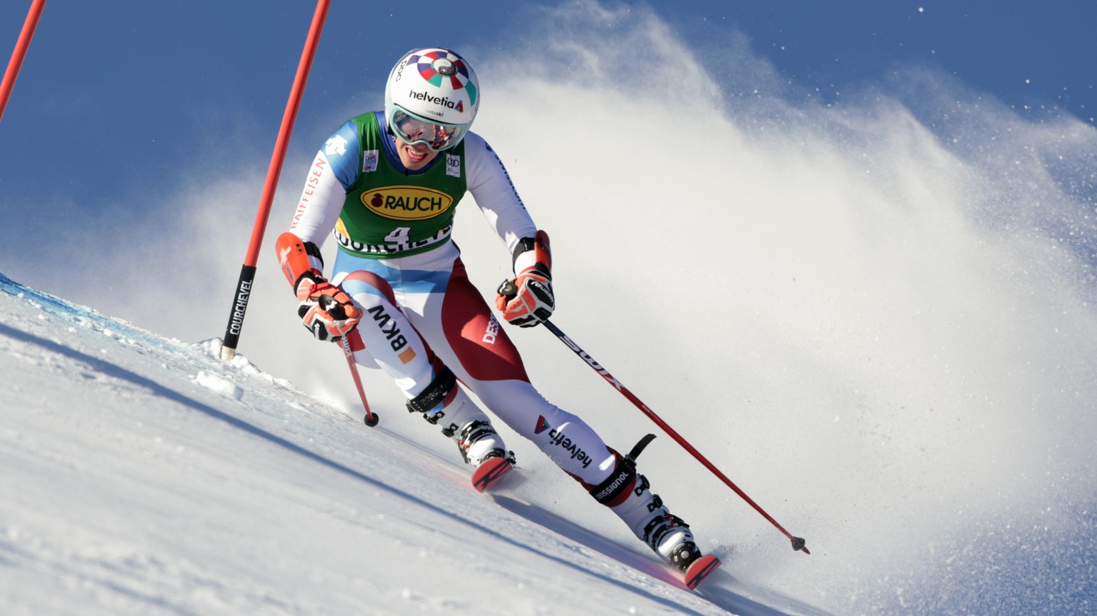 Switzerland&#039;s Michelle Gisin speeds down the slope during the first run of an alpine ski, women&#039;s World Cup giant slalom, in Courchevel, France, Tuesday, Dec. 21, 2021. (AP Photo/Giovanni Ma ...