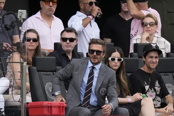 David Beckham, center, a co-owner and president of soccer operations for Inter Miami, watches an MLS soccer match against Los Angeles FC, Saturday, March 12, 2022, in Fort Lauderdale, Fla. (AP Photo/R ...