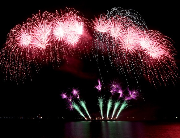 Fireworks from Japan light up the sky at the start of the 6th Pyro musical competition Saturday, Feb.7, 2015 at the Mall of Asia shopping complex at suburban Pasay city south of Manila, Philippines. The fireworks competition, which runs for six consecutive weekends, features entries from 11 countries with Canada winning the championship last year. (AP Photo/Bullit Marquez)
