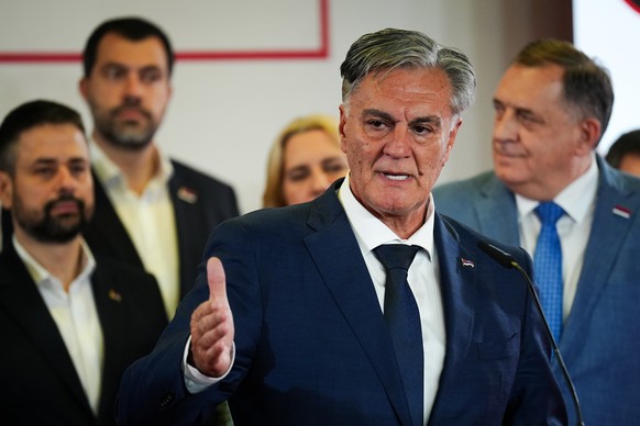 epa12544919 Sinisa Karan, the Alliance of Independent Social Democrats (SNSD) candidate for President of Republika Srpska, speaks to the media following the announcement of the first exit poll results ...