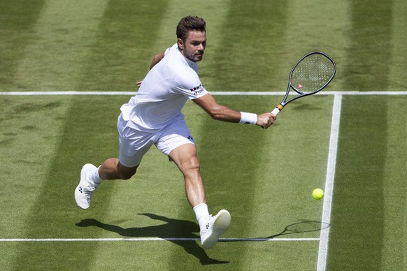 Stan Wawrinka of Switzerland in action during his first round match against Ruben Bemelmans of Belgium, at the All England Lawn Tennis Championships in Wimbledon, London, on Monday, July 1, 2019.(KEYS ...