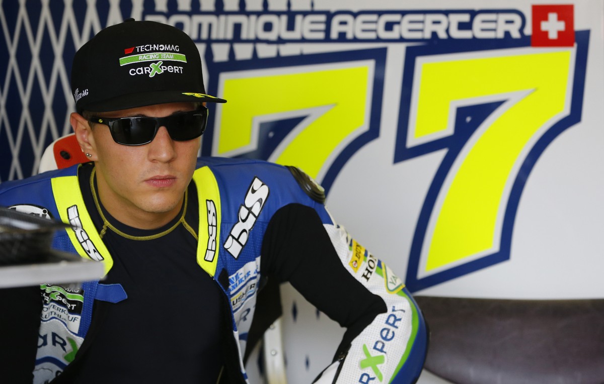 Moto2 rider Dominique Aegerter of Switzerland is ready for the free practice ahead of Sunday's Japanese Grand Prix at Twin Ring Motegi circuit in Motegi, north of Tokyo, Japan, Friday, Oct. 10, 2 ...