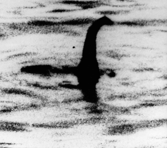 FILE -This is an undated file photo of a shadowy shape that some people say is a photo of the Loch Ness monster in Scotland. For hundreds of years, visitors to Scotland&#039;s Loch Ness have described ...