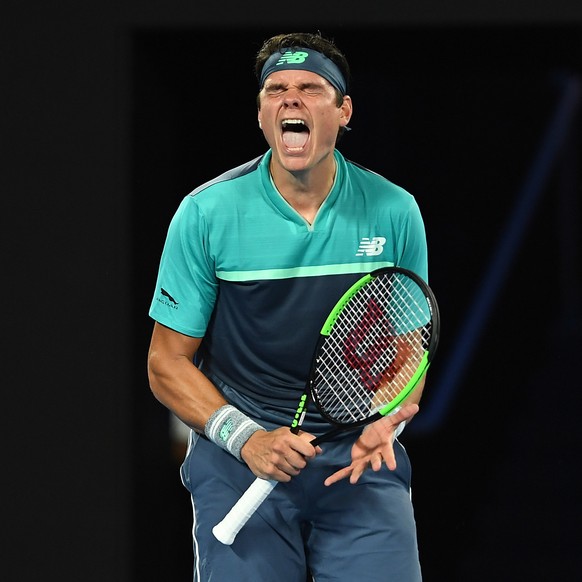 epa07291619 Milos Raonic of Canada reacts to losing a point during the match against Stan Wawrinka of Switzerland during their second round match on day four of the Australian Open tennis tournament i ...