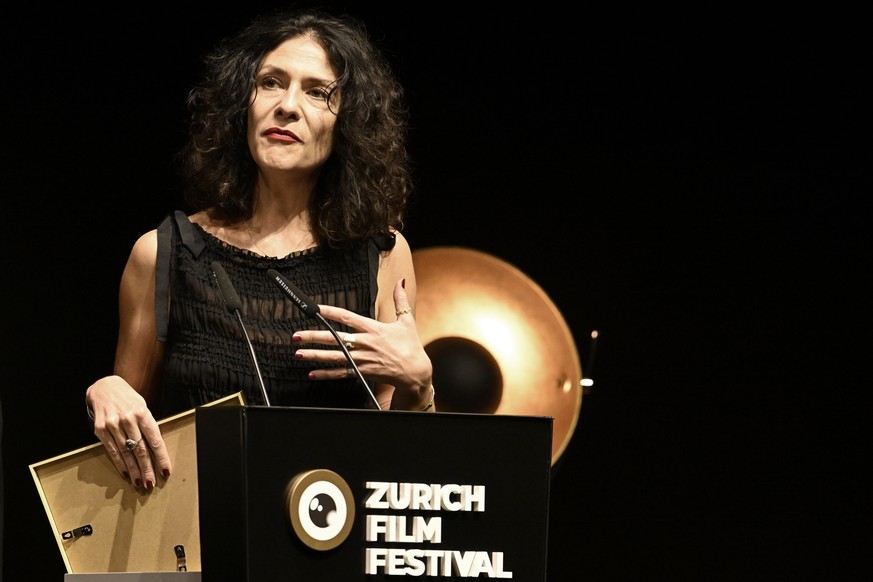 Andrina Mracnikar receives the Audience Award for MILA / MARIJA during the Award Night ceremony of the 22nd Zurich Film Festival (ZFF) in Zurich, Switzerland, Saturday, October 3, 2026. (KEYSTONE/Walt ...