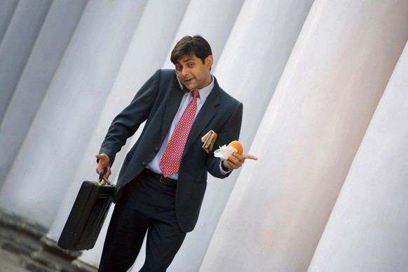 On the go: Food, mobile phone, briefcase. All work. All the time.