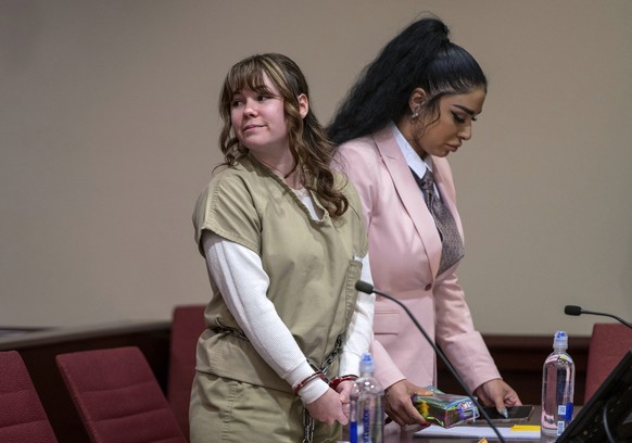 Hannah Gutierrez Reed, left, and paralegal Carmella Sisneros await sentencing in state district court in Santa Fe, New Mexico, on Monday April 15, 2024. Reed, the armorer on the set of the Western fil ...