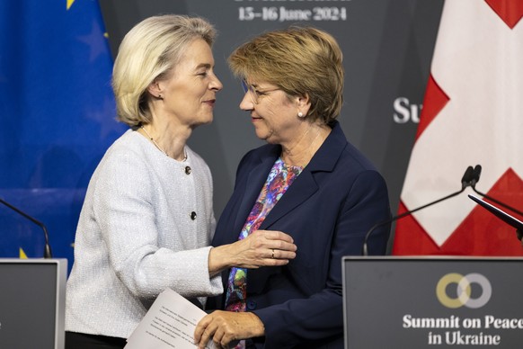 Ursula von der Leyen President of European Commission, left, and Swiss Federal President Viola Amherd say goodbye after the final joint press conference, during the Summit on peace in Ukraine, in Stan ...