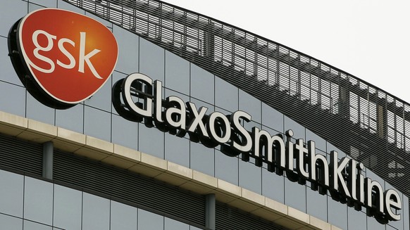 FILE - This April 28, 2010 file photo shows British drugmaker GlaxoSmithKline&#039;s headquarters in London. Hundreds of GlaxoSmithKline&#039;s 17,000 U.S.-based employees will lose their jobs by the  ...