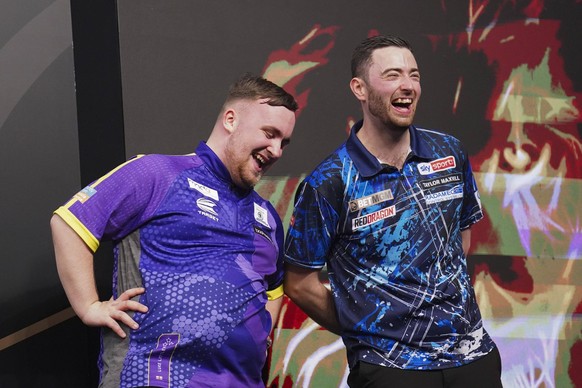2024 BetMGM Premier League Darts, Play-Offs, O2 London Luke Littler and Luke Humphries share a laugh after the 2024 BetMGM Premier League Darts Play-Offs at The O2 Arena, London, England, United Kingd ...