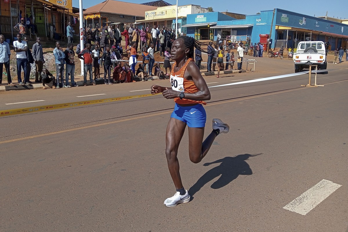 Rebecca Cheptegei, competes at the Discovery 10km road race in Kapchorwa, Uganda Friday, Jan. 20, 2023. A Cheptegei, a Ugandan athlete living in Kenya was set ablaze by her boyfriend on Sunday Sept. 1 ...