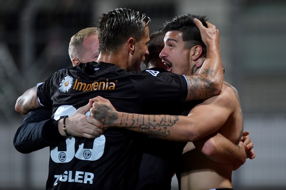 Lugano&#039;s player Joaquin Ardaiz, right, celebrates the 2-0 goal, during the Super League soccer match between FC Lugano and FC St. Gallen, at the Cornaredo stadium in Lugano, on Wednesday, 21 Apri ...