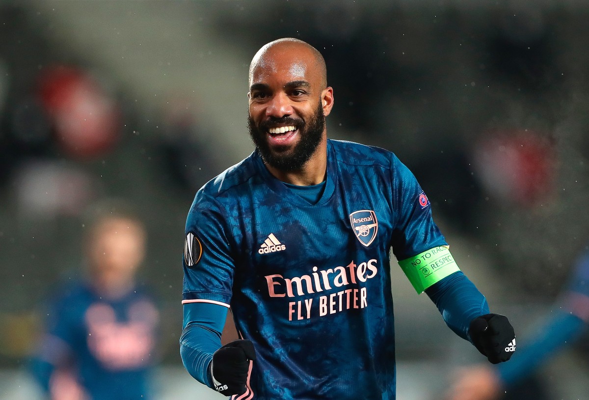 epa09138116 Arsenal's captain Alexandre Lacazette celebrates after scoring the 4-0 lead during the UEFA Europa League quarter final, second leg soccer match between Slavia Prague and Arsenal FC i ...