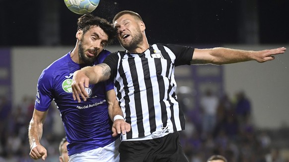 epa06898922 Mijusko Bojovic of Ujpest (L) in action against Kyrylo Petrov of Neftci during the UEFA Europa League first qualifying round, second leg soccer match between Ujpest FC of Hungary and Neftc ...