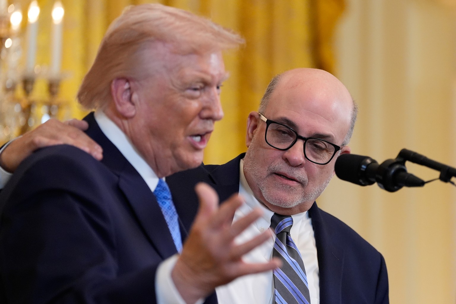 Mark Levin listens as President Donald Trump speaks during a Hanukkah reception in the East Room of the White House, Tuesday, Dec. 16, 2025, in Washington. (AP Photo/Alex Brandon)
Donald Trump