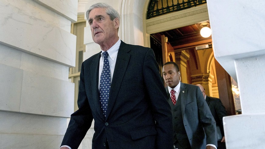 FILE - In this June 21, 2017, file photo, former FBI Director Robert Mueller, the special counsel probing Russian interference in the 2016 election, departs Capitol Hill following a closed door meetin ...