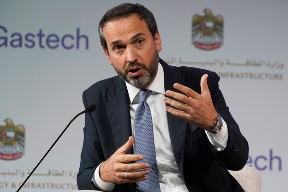 FILE -Turkish Deputy Energy Minister Alparslan Bayraktar gestures during a discussion on stage at the Gastech 2021 conference in Dubai, United Arab Emirates, Sept. 21, 2021. (AP Photo/Jon Gambrell, Fi ...