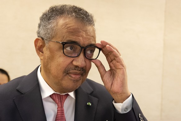 Tedros Adhanom Ghebreyesus, Director General of the World Health Organization (WHO) gestures after his reelection, during the 75th World Health Assembly at the European headquarters of the United Nati ...