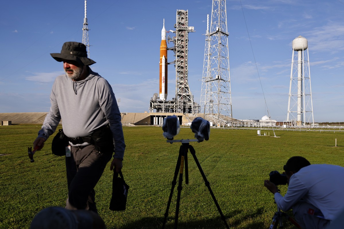 Photographers place remote camera near NASA's new moon rocket as she sits on Launch Pad 39-B Sunday, Nov. 13, 2022, in Cape Canaveral, Fla. NASA's 21st-century moon-exploration program, name ...