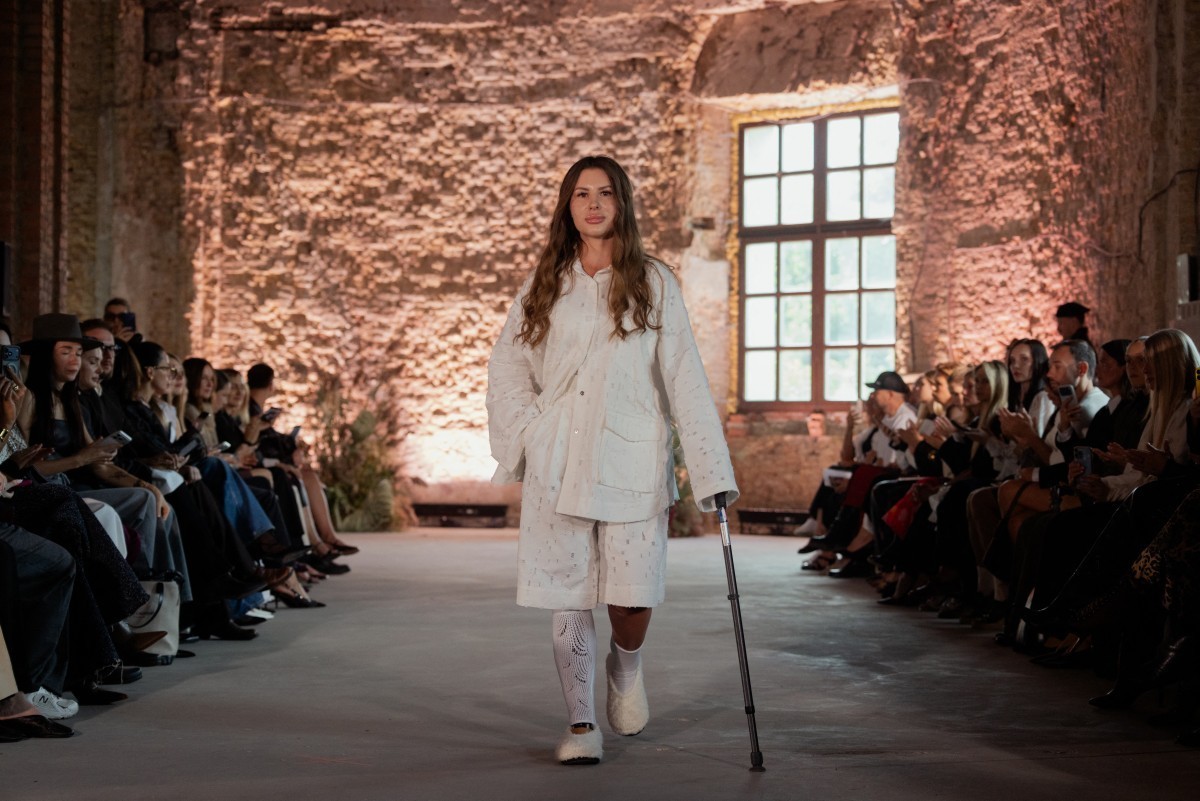 Ukrainian veterans walk down the runway during the Sidletskiy fashion show in collaboration with the U+System Military Prosthetics Center during Ukrainian Fashion Week in Kyiv on September 6, 2026, am ...