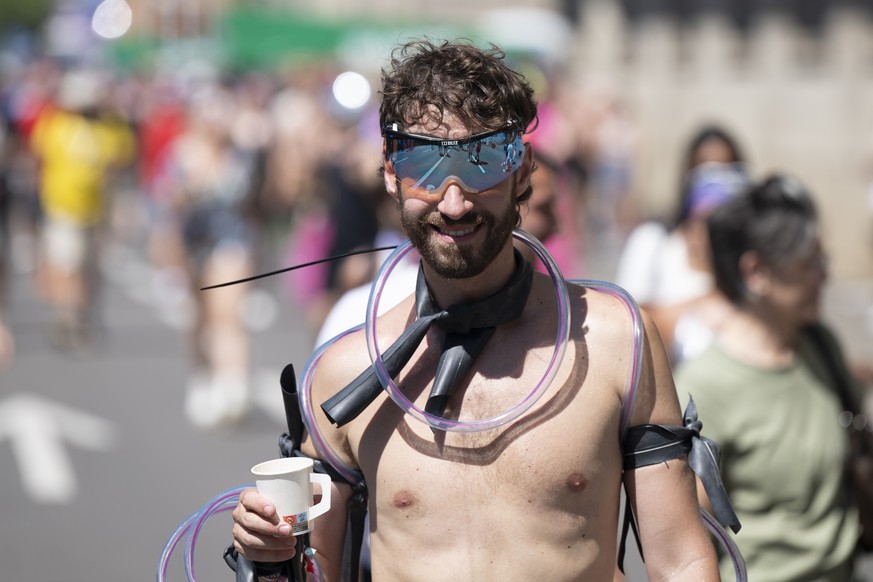 epa11542582 A participant attends the 31st Street Parade in the city center of Zurich, Switzerland, 10 August 2024. The annual dance music event Street Parade runs this year under the motto &#039;Pref ...