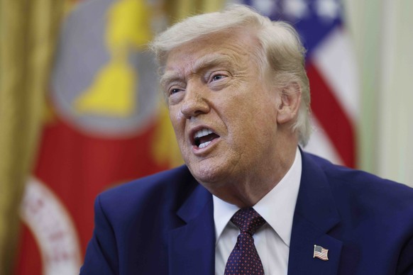 epa13014166 US President Donald J. Trump responds to a question from the news media during an executive order signing ceremony in the Oval Office of the White House in Washington, DC, USA, 03 June 202 ...