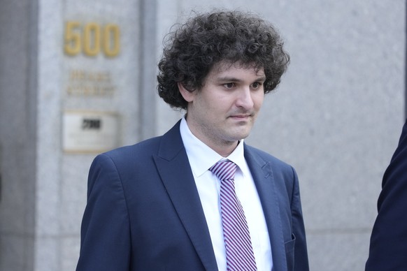 FILE - FTX founder Sam Bankman-Fried leaves federal court on Wednesday, July 26, 2023, in New York.  Prosecutors asked a New York judge on Friday, March 15, 2024, to convict FTX founder Sam Bankman-Fried...