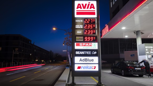 A panel showcases the fuel prices in Swiss francs at an AVIA petrol station in Zurich, Switzerland, on Wednesday, March 9, 2022. (KEYSTONE/Michael Buholzer)