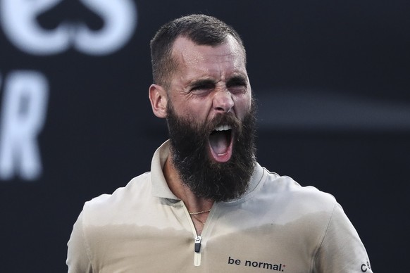 epa09696604 Benoit Paire of France celebrates winning his second round match against Grigor Dimitrov of Bulgaria at the Australian Open Grand Slam tennis tournament in Melbourne, Australia, 20 January ...