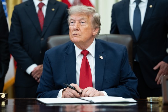 epa13109446 United States President Donald J Trump during a signing ceremony in the Oval Office of the White House in Washington, DC, USA, 13 July 2026. Trump signed an executive order that modifies t ...