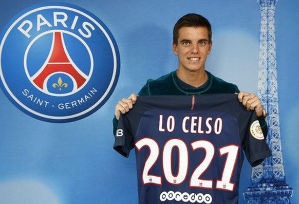 epa05442022 An undated handout photo provided by Paris Saint Germain pressroom on 26 July 2016 shows attacking midfielder Giovani Lo Celso posing for photogrpahs with the PSG jersey. Lo Celso signed o ...