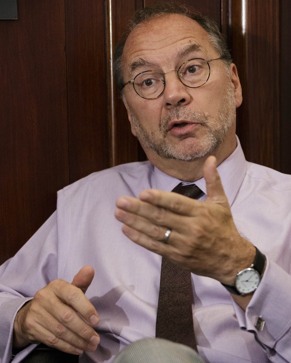 Dr. Peter Piot, the co-discoverer of the Ebola virus, speaks during an interview with The Associated Press at his office at the London School of Hygiene and Tropical Medicine in London, Friday, Oct. 1 ...