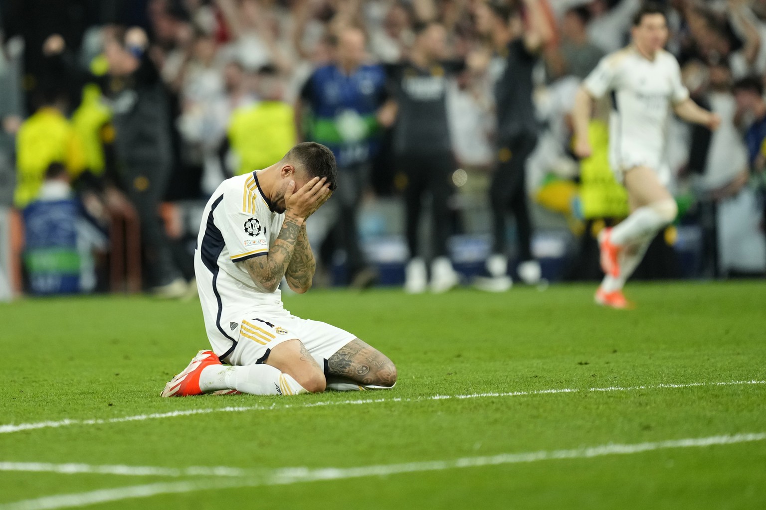 Real Madrid&#039;s Joselu reacts after winning the Champions League semifinal second leg soccer match between Real Madrid and Bayern Munich at the Santiago Bernabeu stadium in Madrid, Spain, Wednesday ...