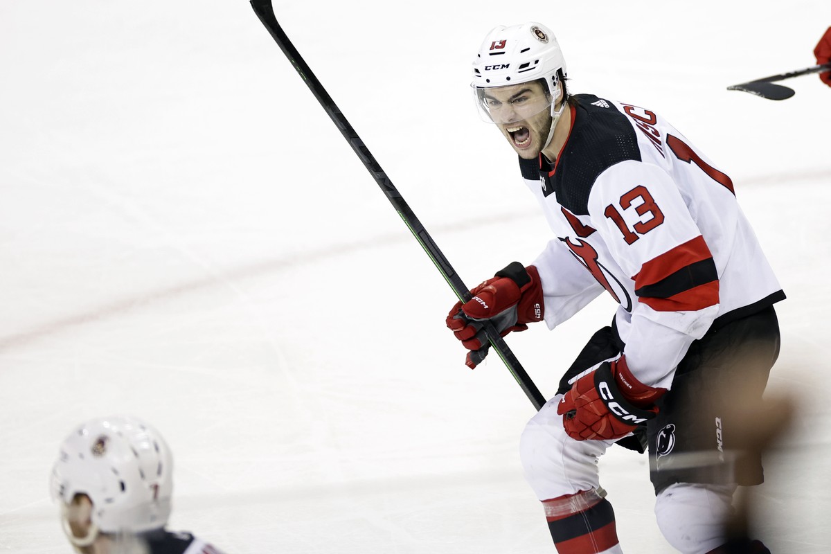 New Jersey Devils center Nico Hischier yells towards Dougie Hamilton after Hamilton scored the game winning goal against the New York Rangers in overtime of Game 3 of the team's NHL hockey Stanle ...