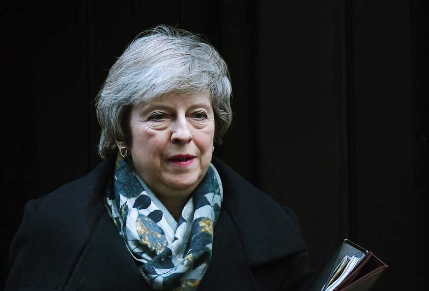 epa07237422 British Prime Minister Theresa May departs 10 Downing Street in London, Britain, 17 December 2018. British Prime Minister Theresa May is set to make a statement in the Commons on Brexit, r ...