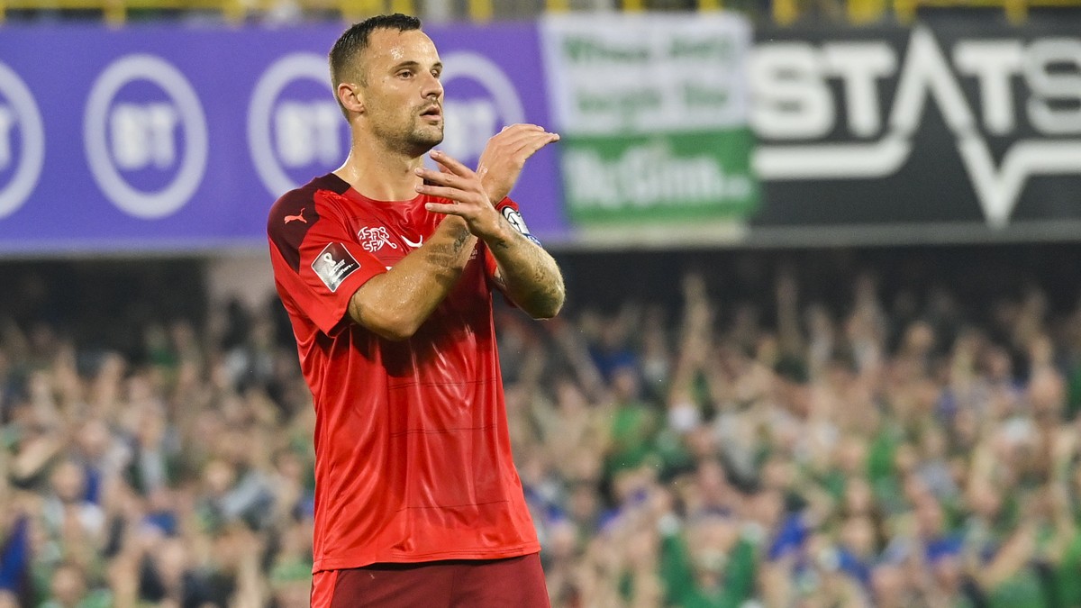 epa09456297 Switzerland's Haris Seferovic reacts after missing a penalty during the FIFA World Cup 2022 group C qualifying soccer match between Northern Ireland and Switzerland at Windsor Park st ...