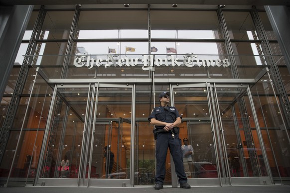 FILE- A police officer stands guard outside The New York Times building in New York, on June 28, 2018. (AP Photo/Mary Altaffer, File)
Trump Lawsuit New York Times