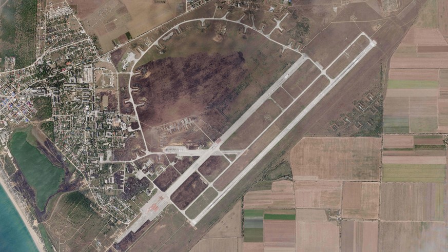 A satellite image by Planet Labs PBC shows Saki Air Base after an explosion there Wednesday, Aug. 10, 2022, in the Crimean Peninsula, the Black Sea peninsula seized from Ukraine by Russia and annexed  ...