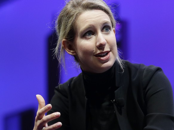 FILE - In this Nov. 2, 2016, file photo, Elizabeth Holmes, founder and CEO of Theranos, speaks at the Fortune Global Forum in San Francisco. Forbes announced on June 1, 2016, that it has revised its e ...