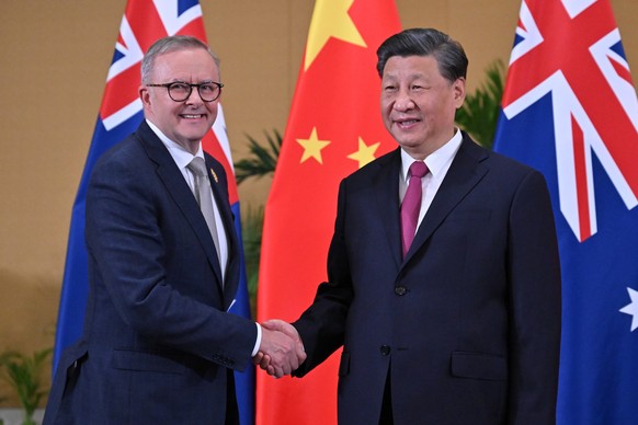 epa10306485 Australia&#039;s Prime Minister Anthony Albanese (L) and China&#039;s President Xi Jinping shake hands prior to a bilateral meeting on the sidelines of the G20 Leaders&#039; Summit in Bali ...