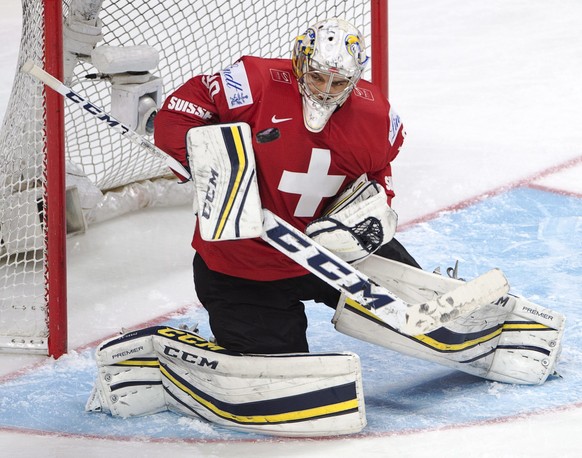 Switzerland goaltender Joren van Pottelberghe (30) makes a save during the second period of a world junior championship hockey game in Montreal on Wednesday, Dec. 28, 2016. (Ryan Remiorz/The Canadian  ...