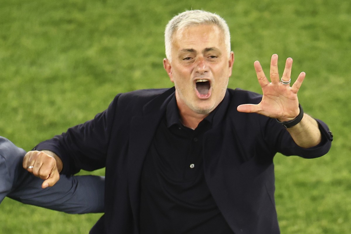 Roma's coach Jose Mourinho celebrates at the end of the Europa Conference League final soccer match between AS Roma and Feyenoord at the National Arena stadium in Tirana, Albania, Wednesday, May  ...