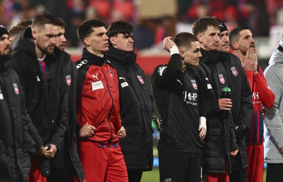 epa11911195 Players of Heidenheim leave the pitch after losing the UEFA Conference League knockout phase play-offs 2nd leg match 1. FC Heidenheim against FC Copenhagen, in Heidenheim, Germany, 20 Febr ...