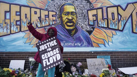 A person reacts near Cup Foods after a guilty verdict was announced at the trial of former Minneapolis police Officer Derek Chauvin for the 2020 death of George Floyd, Tuesday, April 20, 2021, in Minn ...