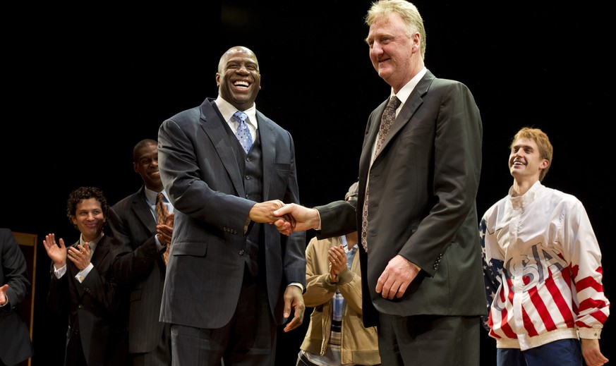 Earvin &quot;Magic&quot; Johnson, left, and Larry Bird appear at the curtain call for the opening night performance of the Broadway play &quot;Magic/Bird&quot; in New York, Wednesday, April 11, 2012.  ...