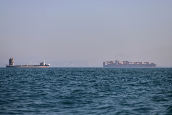 A container ship, right, and a cargo vessel are seen in the Strait of Hormuz off Bandar Abbas, Iran, Wednesday, June 17, 2026. (Amirhosein Khorgooi/ISNA via AP)
Iran War Strait of Hormuz