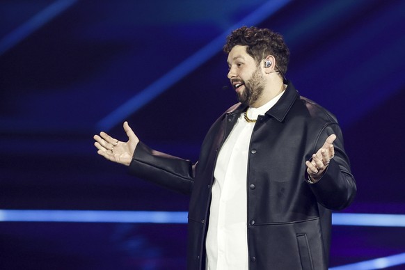 epa09216270 James Newman from United Kingdom poses during the Second Semi-Final of the 65th annual Eurovision Song Contest (ESC) at the Rotterdam Ahoy arena, in Rotterdam, The Netherlands, 20 May 2021 ...